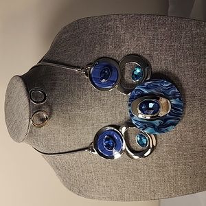 Exquisitely designed blue and silver necklace and earrings